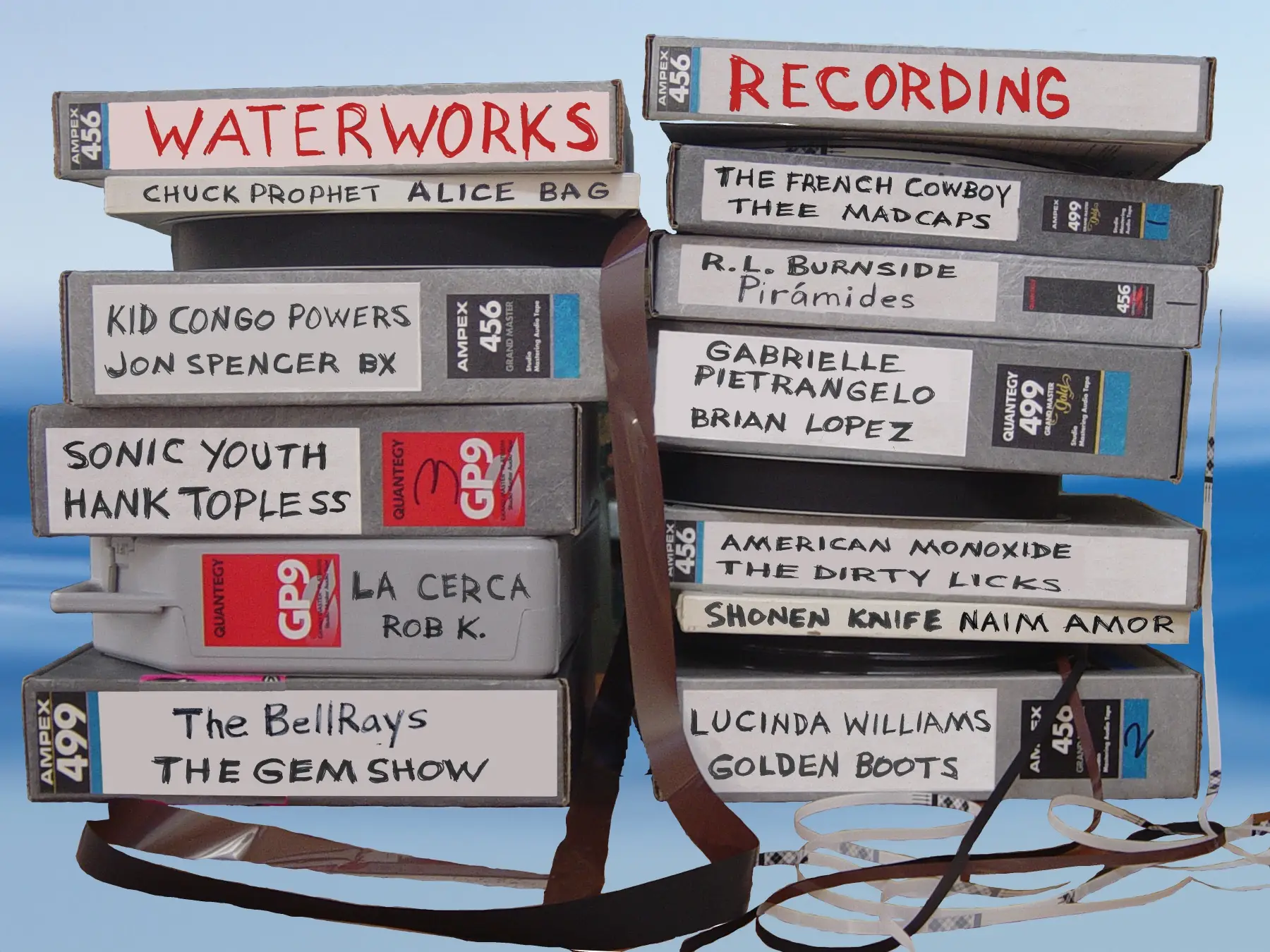 Stacks of Ampex and Quantegy tape boxes labeled in marker: Waterworks Recording, Chuck Prophet, Alice Bag, Kid Congo Powers, Jon Spencer BX, Sonic Youth, Hank Topless, La Cerca, Rob K., The BellRays, The Gem Show, The French Cowboy, Thee Madcaps, R.L. Burnside, Pirámides, Gabrielle Pietrangelo, Brian Lopez, American Monoxide, The Dirty Licks, Shonen Knife, Naim Amor, Lucinda Williams, Golden Boots.